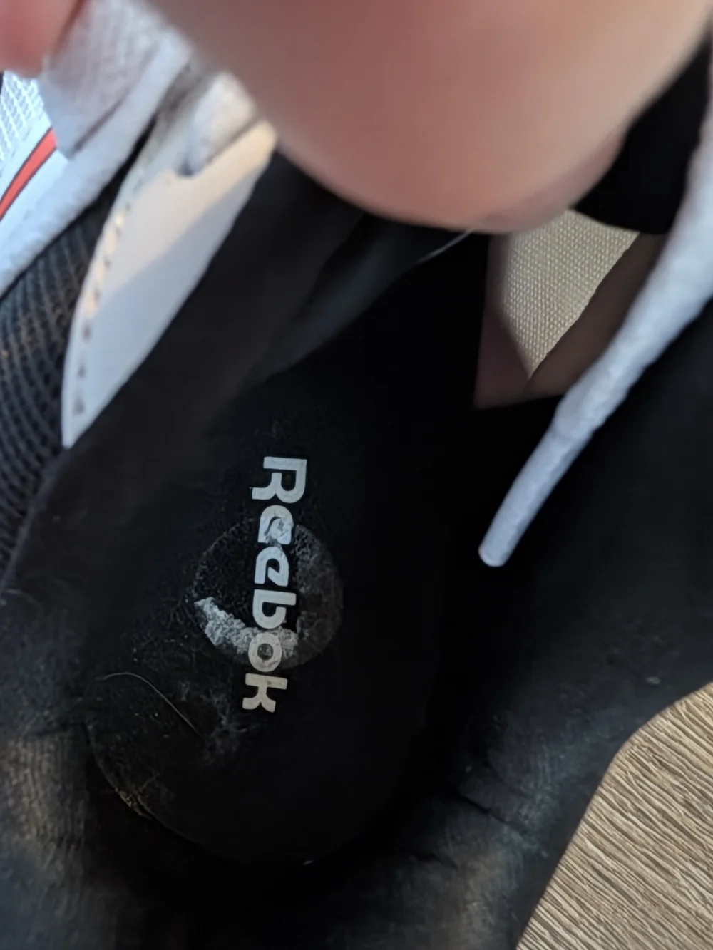 Men's Lace- Up Reebok Nano Sneakers.